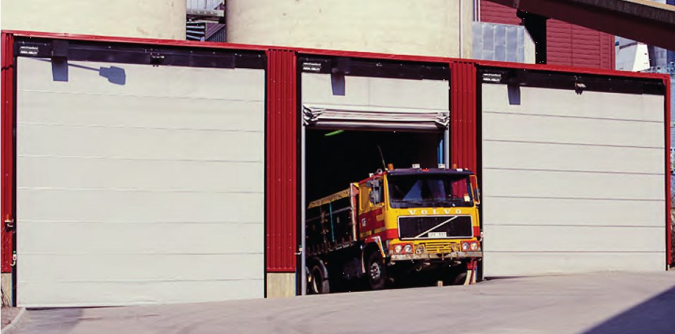 Frequency controlled vertical-lifting fabric door